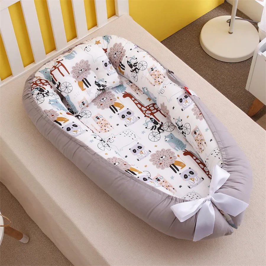 Reducteur de lit - Le cocon des bébés