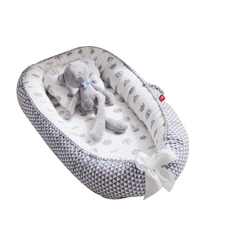 Reducteur de lit - Le cocon des bébés
