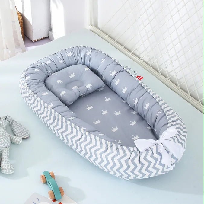 Reducteur de lit - Le cocon des bébés