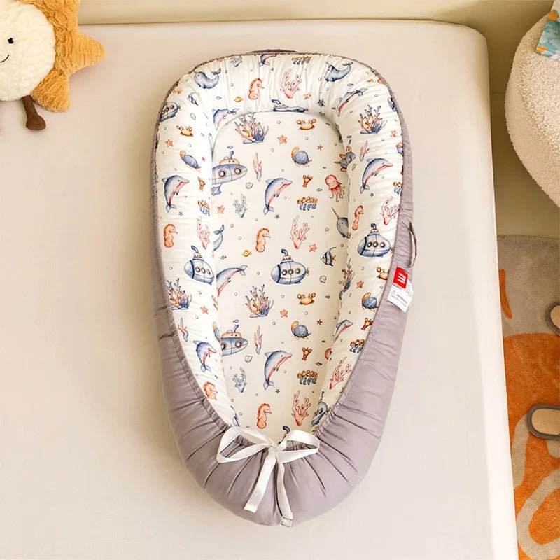 Reducteur de lit - Le cocon des bébés