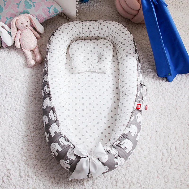 Reducteur de lit - Le cocon des bébés